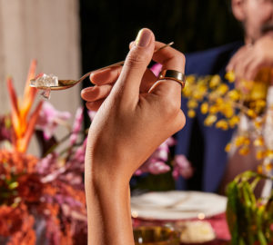 Person eating dinner wearing an Oura Ring