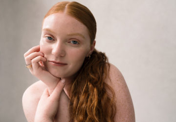 Redhaired Woman Wearing Oura Ring