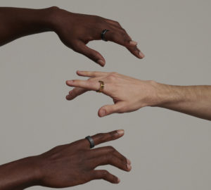 hands wearing oura ring