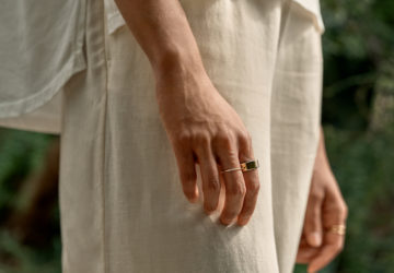 woman standing wearing oura ring