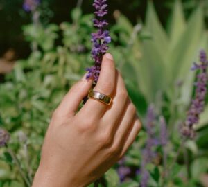 Hand wearing Oura Ring