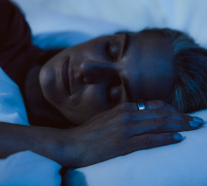 Woman Sleeping With Oura Ring