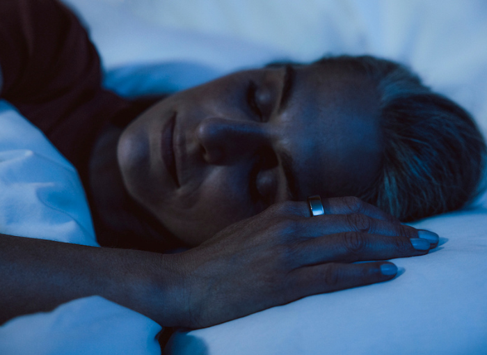 Woman Sleeping With Oura Ring