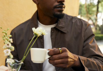 Man Wearing Oura Ring Drinking Coffee