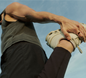 A man using his Oura ring to track his fitness