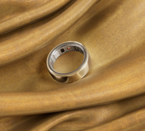 Gold Oura Ring 4 on gold fabric