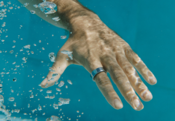 Man wearing Oura Ring in water