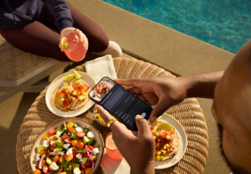 Man wearing Oura Ring taking a picture of food