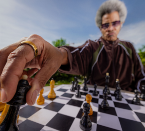 Person wearing chess wearing Oura Ring