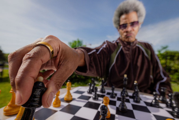 Person wearing chess wearing Oura Ring