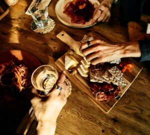 People sharing a meal wearing Oura Ring