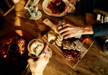 People sharing a meal wearing Oura Ring