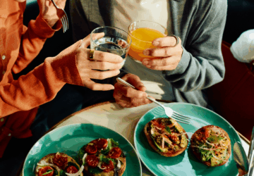Women sharing a meal together wearing Oura Ring