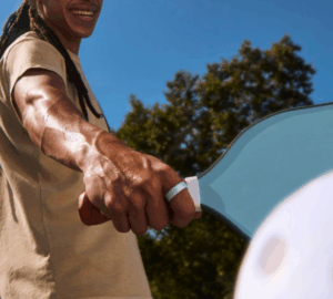 Person playing pickleball wearing Oura Ring 4 Ceramic