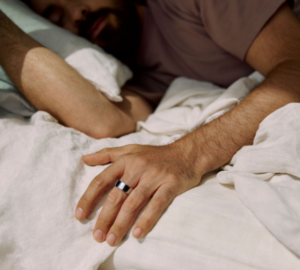 Person sleeping wearing Oura Ring 4