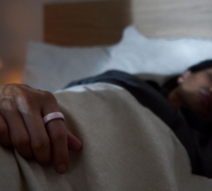 Man sleeping wearing Oura Ring 4