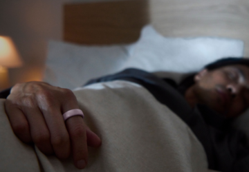 Man sleeping wearing Oura Ring 4