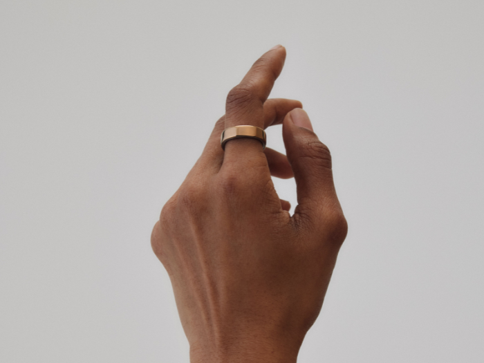 Hand with Oura Ring 5 in Deep Rose