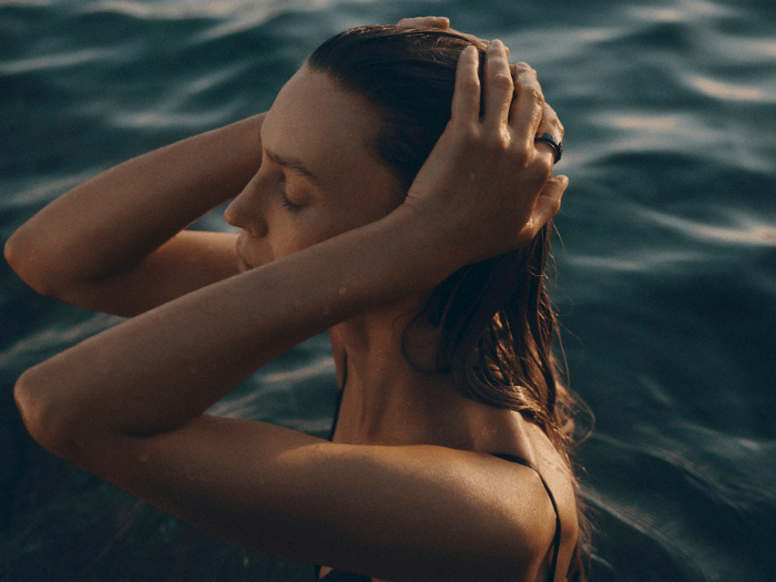 Woman Swimming Wearing Oura Ring
