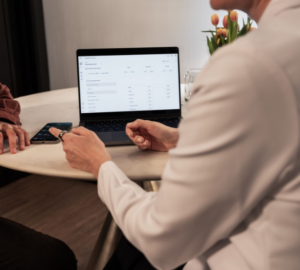 Doctor and patient talking at computer wearing Oura Ring