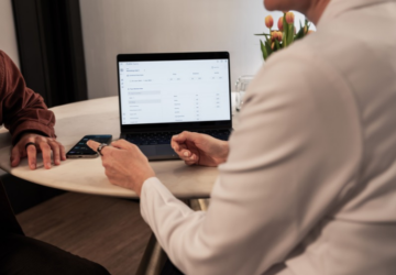 Doctor and patient talking at computer wearing Oura Ring