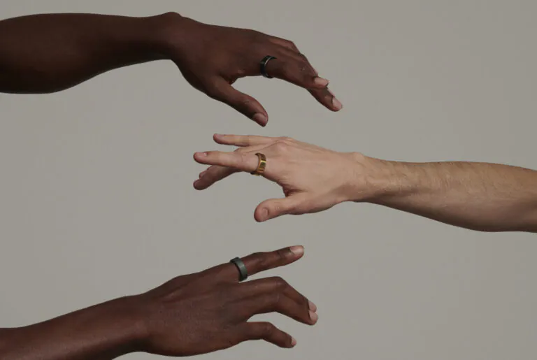 hands wearing oura ring