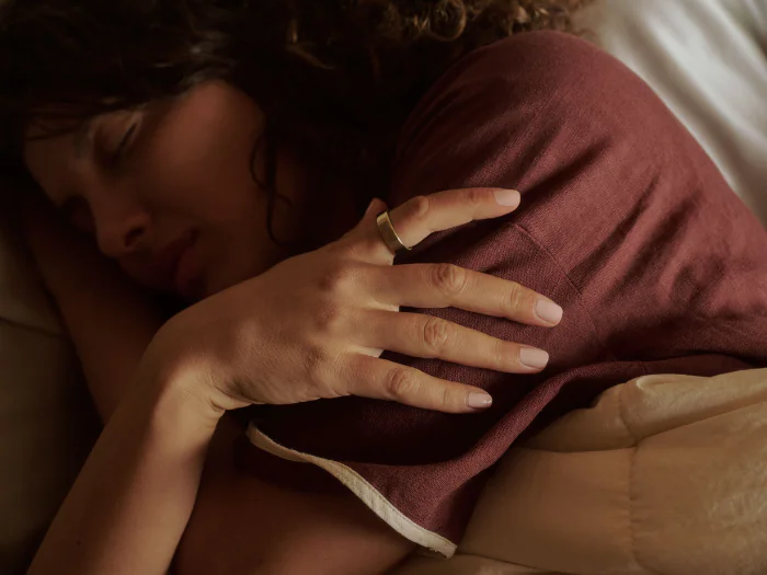 Person sleeping wearing Oura Ring 5