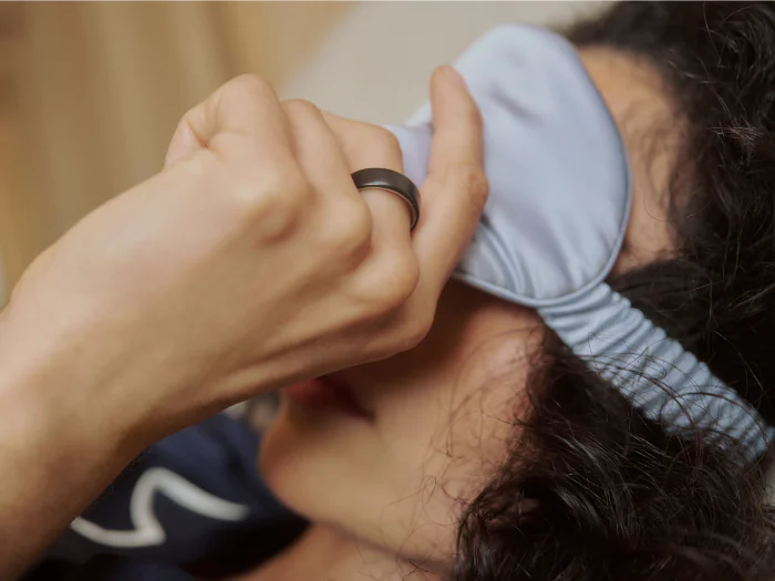 Person sleeping wearing Oura Ring 5