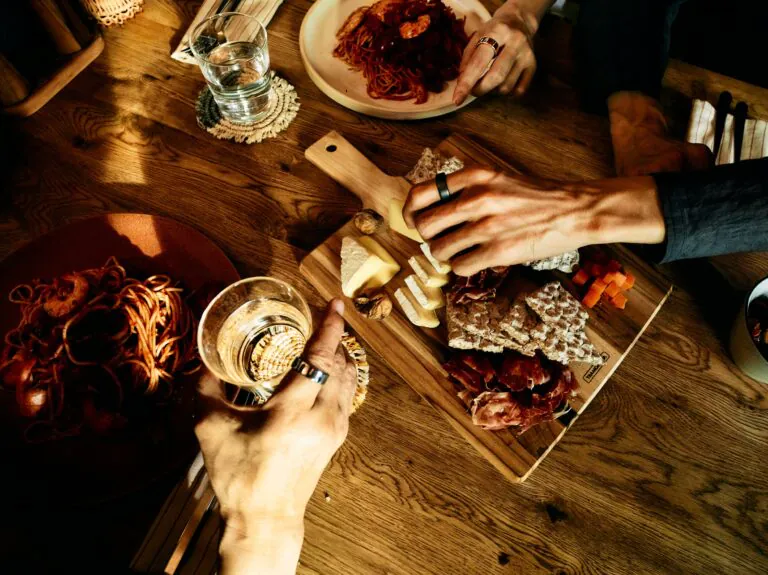 People sharing a meal wearing Oura Ring