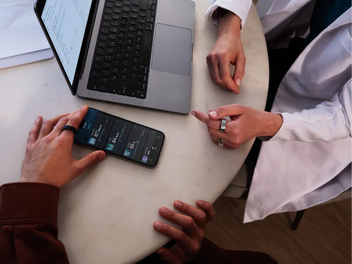 Person in doctor's office sharing Oura data